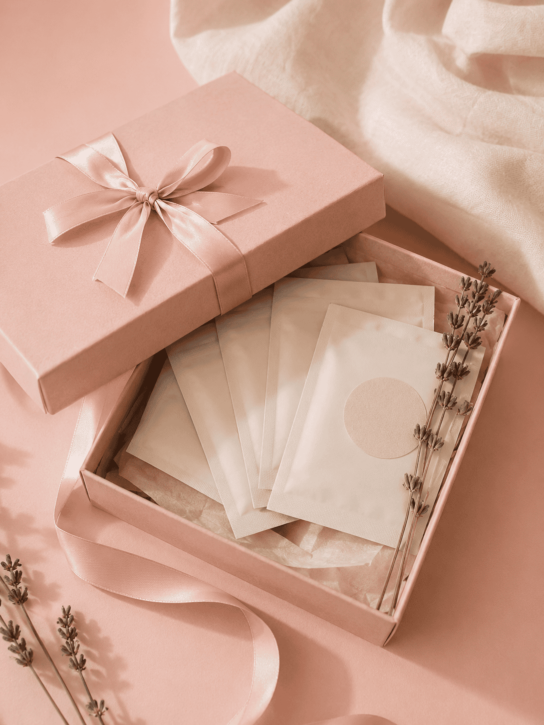 Sleep patch sachets in a pink gift box with lavender